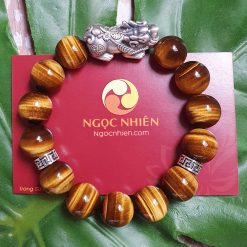 Vòng Đá mắt hổ nâu vàng 12 ly mix charm bạc Tỳ Hưu, chữ Vạn - vòng tay phong thủy ngọc nhiên